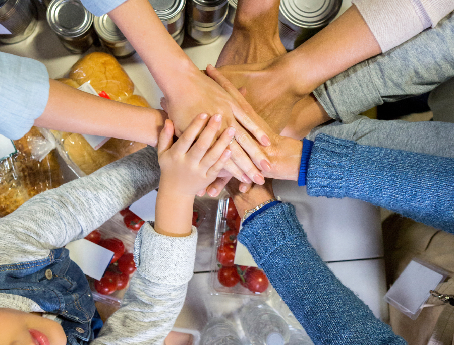 gonnella community outreach team joins hands over food donations