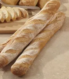 on trend bakery products baguette on pale background